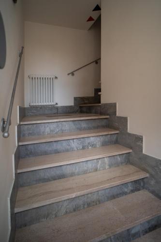 a set of stairs in a building at La Dimora alle Scalette in Orvieto