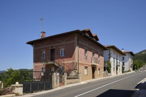 a building on the side of a street at The Great Escape by Fidalsa in Gautegiz Arteaga