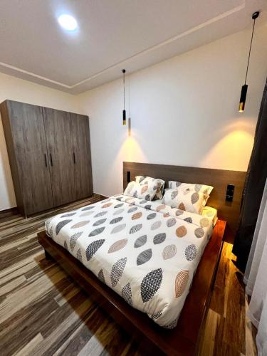 Una cama o camas en una habitación de Résidence Sonko