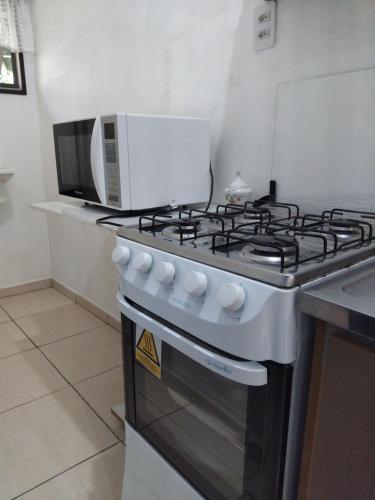 Dapur atau dapur kecil di Recanto Área Verde, tradição e cultura alemã