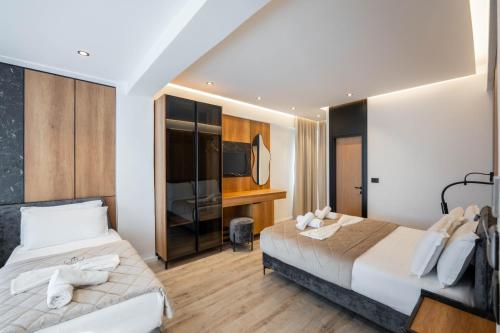 Postel nebo postele na pokoji v ubytování Hotel Joni