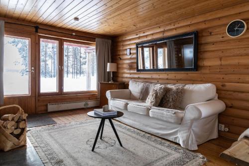 Posezení v ubytování Lapland Arctic Cabins