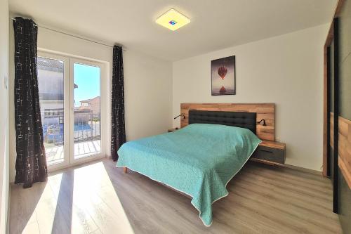 Postel nebo postele na pokoji v ubytování Opatija Apartments Duema Pobri