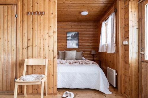 Postel nebo postele na pokoji v ubytování Lapland Arctic Cabins