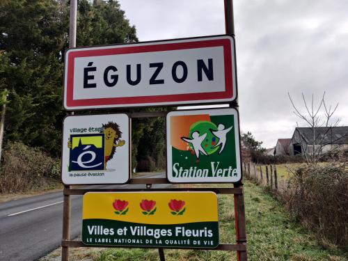 a group of signs on the side of a road at Chambres d'hôtes / B&B Chez Mon Rêve in Éguzon-Chantôme
