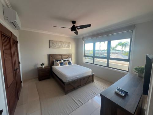 Ένα ή περισσότερα κρεβάτια σε δωμάτιο στο The Country Club Residences at Grand Reserve