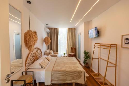 a bedroom with a large bed in a room at Villa Shafeti in Ksamil