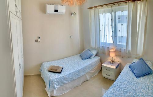 Postel nebo postele na pokoji v ubytování Boho Bay Apartment