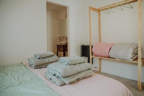 En eller flere senge i et værelse på Hol Gok Patagonia