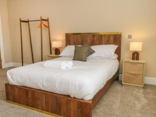 Postel nebo postele na pokoji v ubytování Meadow Manor And Spa