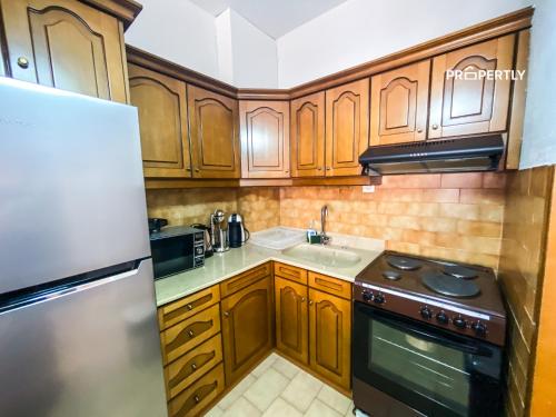 Η κουζίνα ή μικρή κουζίνα στο Sunset & Sea Family Apartment