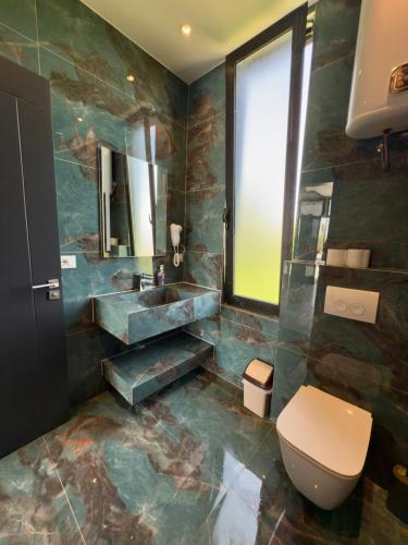 Ένα μπάνιο στο Sueño Luxury Villa