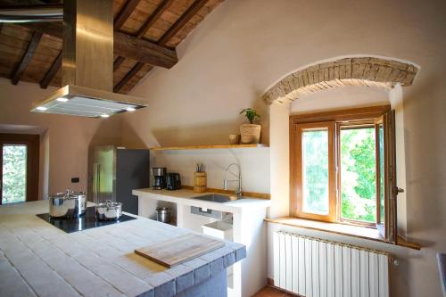 Una cocina o zona de cocina en Villa Fonteintanata