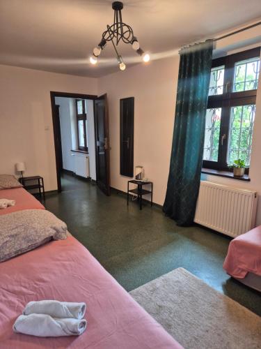Postel nebo postele na pokoji v ubytování Hostel Dobranocka