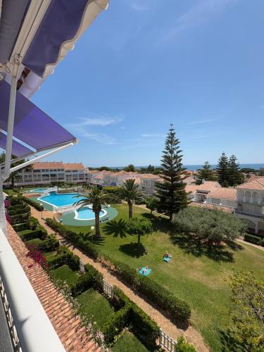 a view from the balcony of a resort with a swimming pool at APCOSTAS - Complejo Al Andalus in Alcossebre
