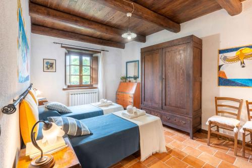 Ένα ή περισσότερα κρεβάτια σε δωμάτιο στο Agriturismo Valli