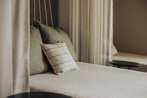 Postel nebo postele na pokoji v ubytování Hotel Lisetta