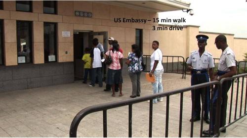 a group of people standing outside of a building at Mona Studio suite in Kingston