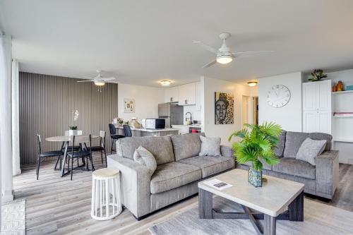 a living room with a couch and a table at Ocean View, Community Perks Makaha Valley Condo! in Waianae