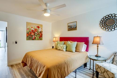a bedroom with a bed and a ceiling fan at Ocean View, Community Perks Makaha Valley Condo! in Waianae