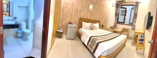 Katil atau katil-katil dalam bilik di Hotel Xuân Ngọc
