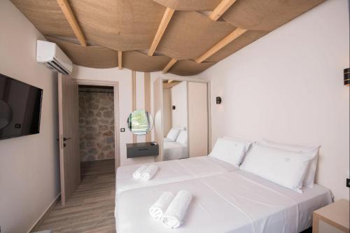 Ένα ή περισσότερα κρεβάτια σε δωμάτιο στο Sivota Lefkas Eagle Villas