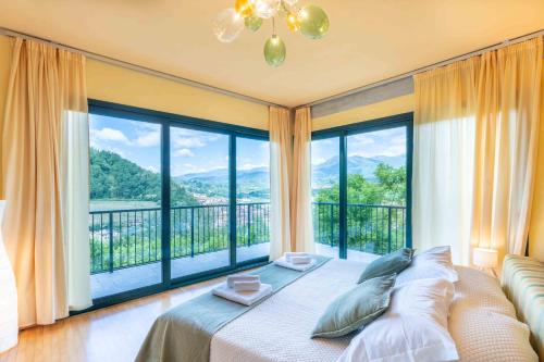 Ένα ή περισσότερα κρεβάτια σε δωμάτιο στο Villa Miranda - Design & Relax