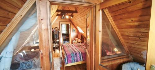 Posteľ alebo postele v izbe v ubytovaní Domek Raj Zakopane