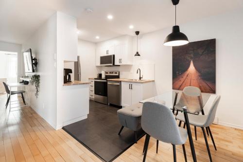 Η κουζίνα ή μικρή κουζίνα στο Appartements Les Havres de Limoilou