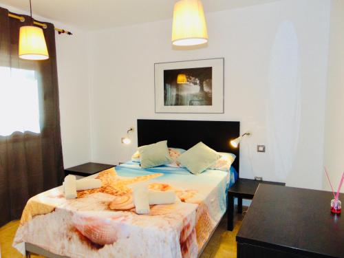 Postel nebo postele na pokoji v ubytování Mi Casita Fuerteventura