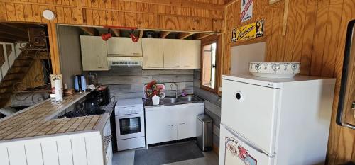 Η κουζίνα ή μικρή κουζίνα στο Le Chalet Fiolant