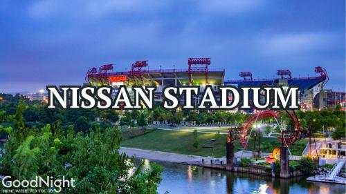 a sign that reads nissan stadium at night at The Saddlery - Key Note - Walk to Broadway in Nashville