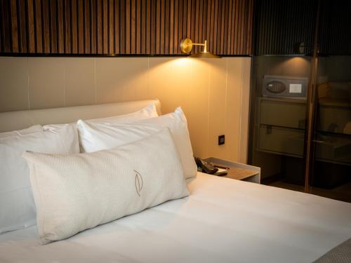Nohian Collection Hotelsにあるベッド
