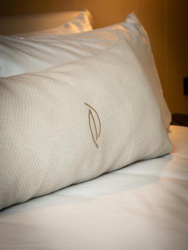 Nohian Collection Hotelsにあるベッド
