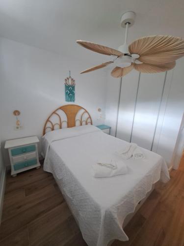 En eller flere senge i et værelse på apartamento cascada