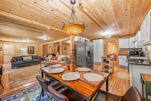 a kitchen and living room with a table and chairs at Downtown Mentone - Baileys Bungalow in Mentone