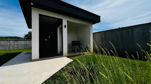 Κήπος έξω από το Villa LUSSO