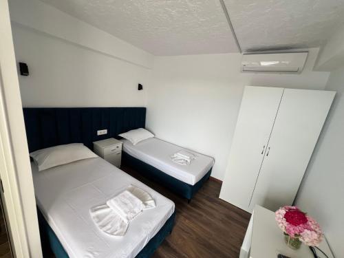 Ένα ή περισσότερα κρεβάτια σε δωμάτιο στο Iart Residence