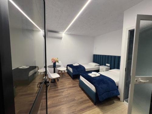 Ένα ή περισσότερα κρεβάτια σε δωμάτιο στο Iart Residence