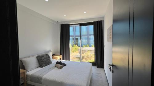 Katil atau katil-katil dalam bilik di Luxury Seafront Duplex Villa With Pool6