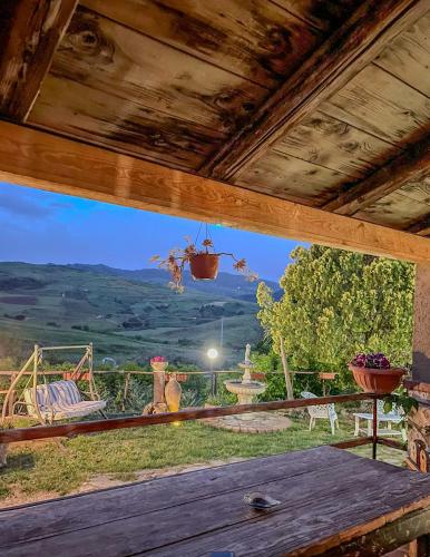 a view from the inside of a cabin with a window at Villa aperta campagna in Nicosia