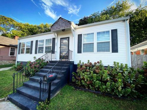 a house with stairs in the front yard at Atlanta Lounge in Midtown in Atlanta