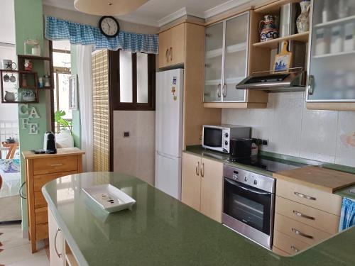 Η κουζίνα ή μικρή κουζίνα στο Apartamento playero