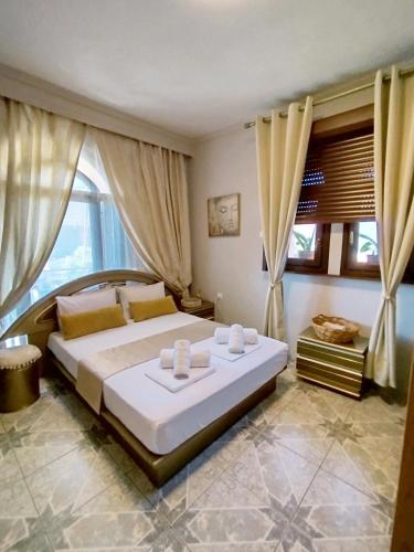 Ein Bett oder Betten in einem Zimmer der Unterkunft Sunrise Suite