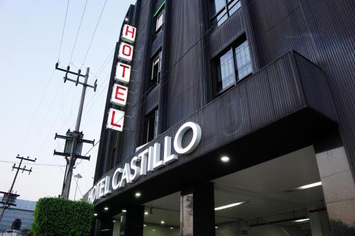a sign on the side of a building at Hotel Castillo in Mexico City