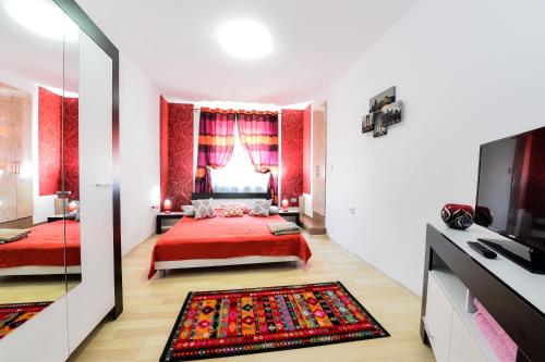 Ένα ή περισσότερα κρεβάτια σε δωμάτιο στο Casa Mihai