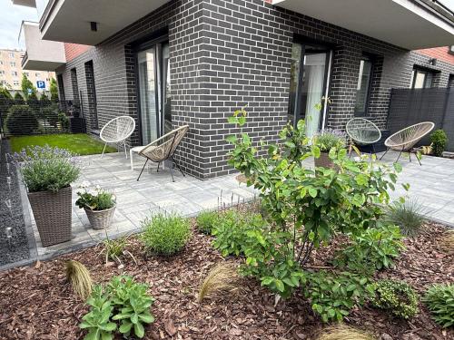 Vonkajšia záhrada v ubytovaní Garden Apartment Old Town