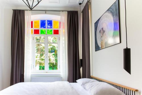 Ένα ή περισσότερα κρεβάτια σε δωμάτιο στο Serguzest Otel
