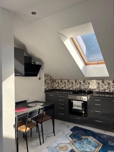 Una cocina o cocineta en SC Apartments Bad Goisern - contactless check in