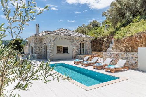 an image of a villa with a swimming pool at Villa Nanoula & Villa Stella Twin Villas Retreat in Skopelos Town